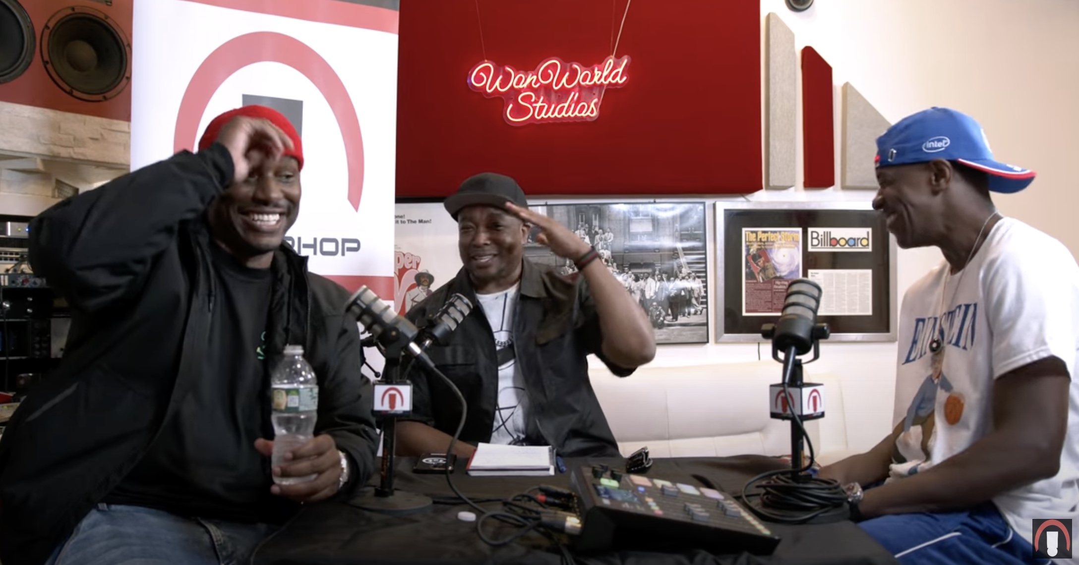 Tyrese, Chuck "Jigsaw" Creekmur and DJ Thoro crack up at some jokes 